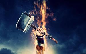 Thor lets loose a mighty Mjolnir strike. thor wallpaper