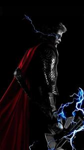 Thor stands tall, ready to face any adversary thor wallpaper