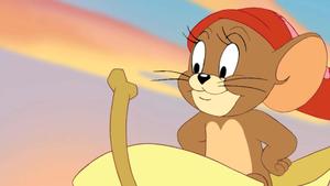 Tom and Jerry smile at each other mischievously Wallpaper