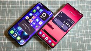 two iphones are shown side by side on a table