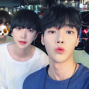 two korean boys are posing for a selfie aesthetic boy wallpaper