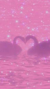 two swans making a heart shape in the water y2k wallpaper
