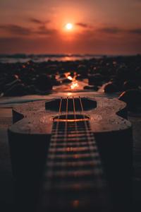 Ukulele During Sunset Phone Background phone wallpaper