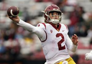 usc quarterback tyler mcgillis throws the ball during a game football wallpaper