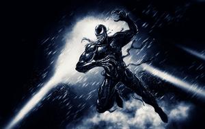 Venom emerging from the shadows, ready for battle. venom wallpaper