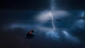 Windows 11 4K Lightning At Sea windows 11 4k wallpaper