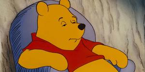 Winnie the Pooh enjoying a sunny day winnie the pooh wallpaper