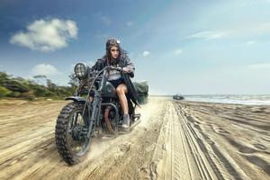 Woman Riding Motorcycle At Beach motorcycle wallpaper