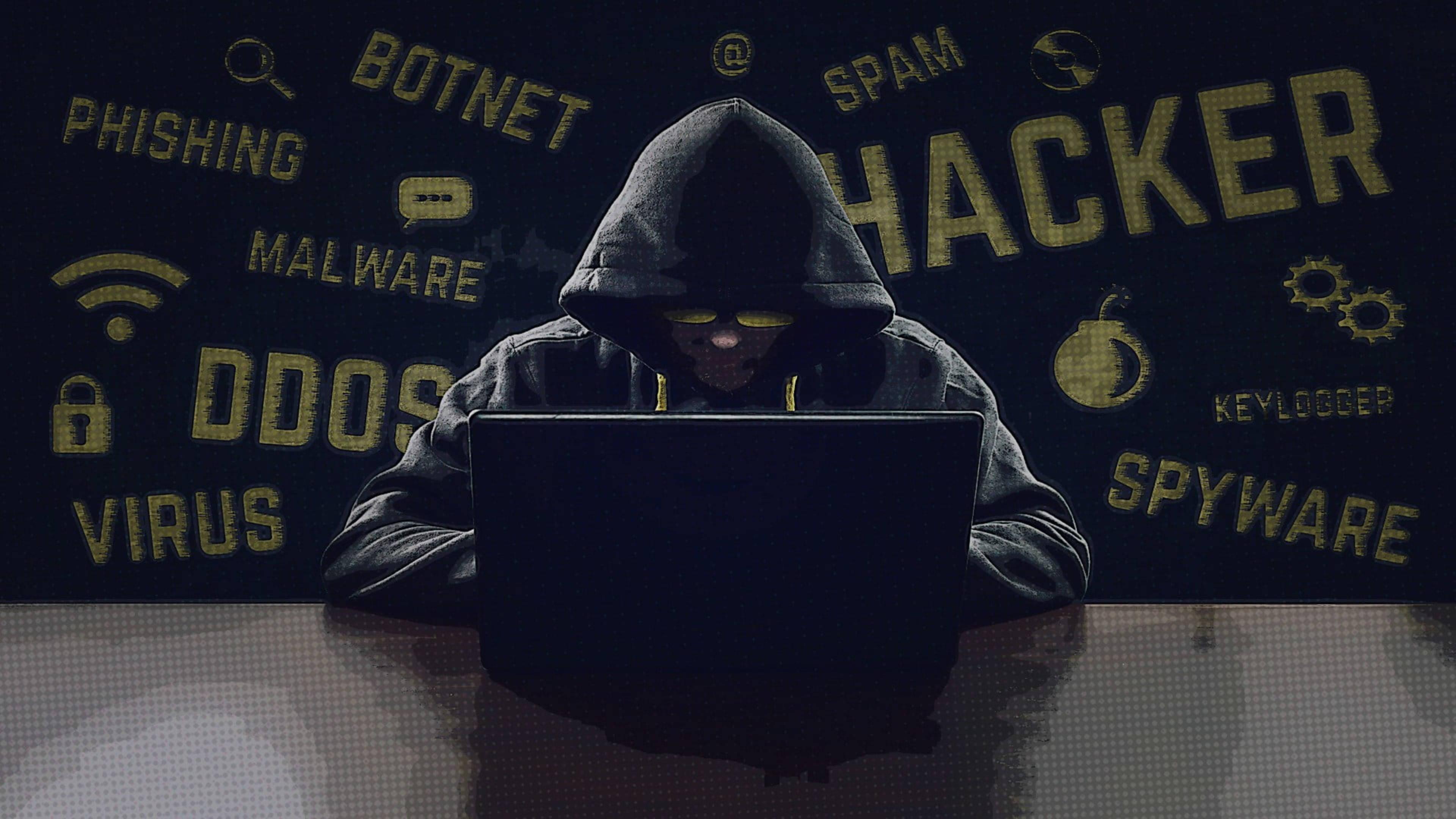 4K Laptop Hooded Hacker Man — 3840x2160 wallpaper