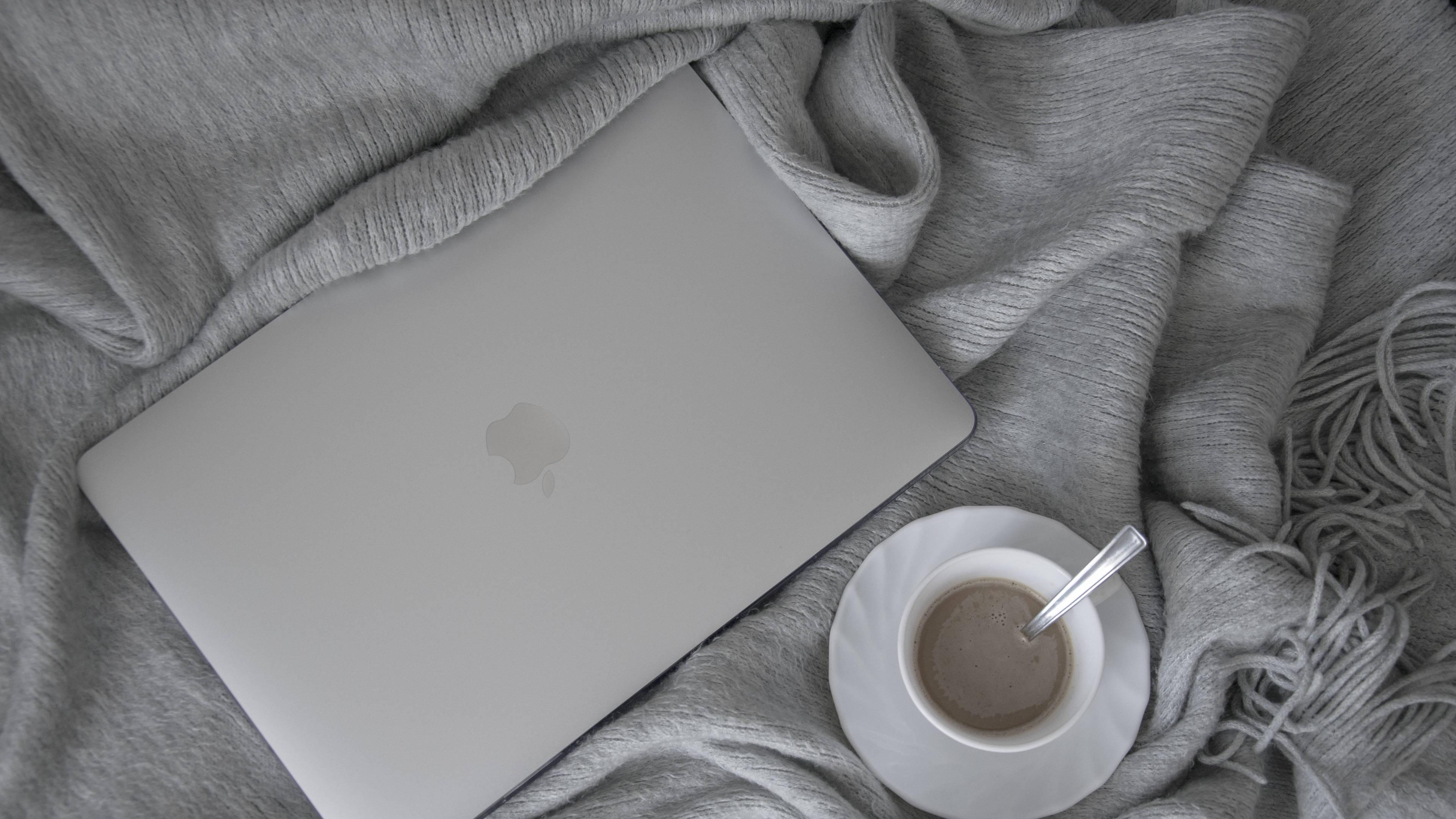 4K Laptop Laptop On Duvet — 3840x2160 wallpaper