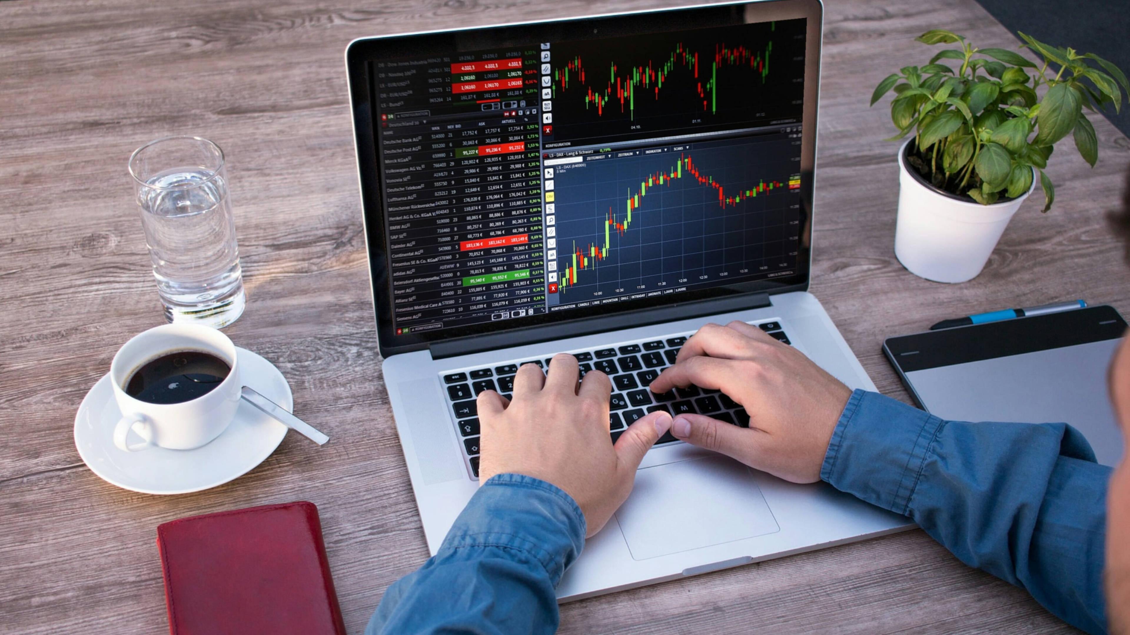 4K Laptop Monitoring Stock Market — 3840x2160 wallpaper