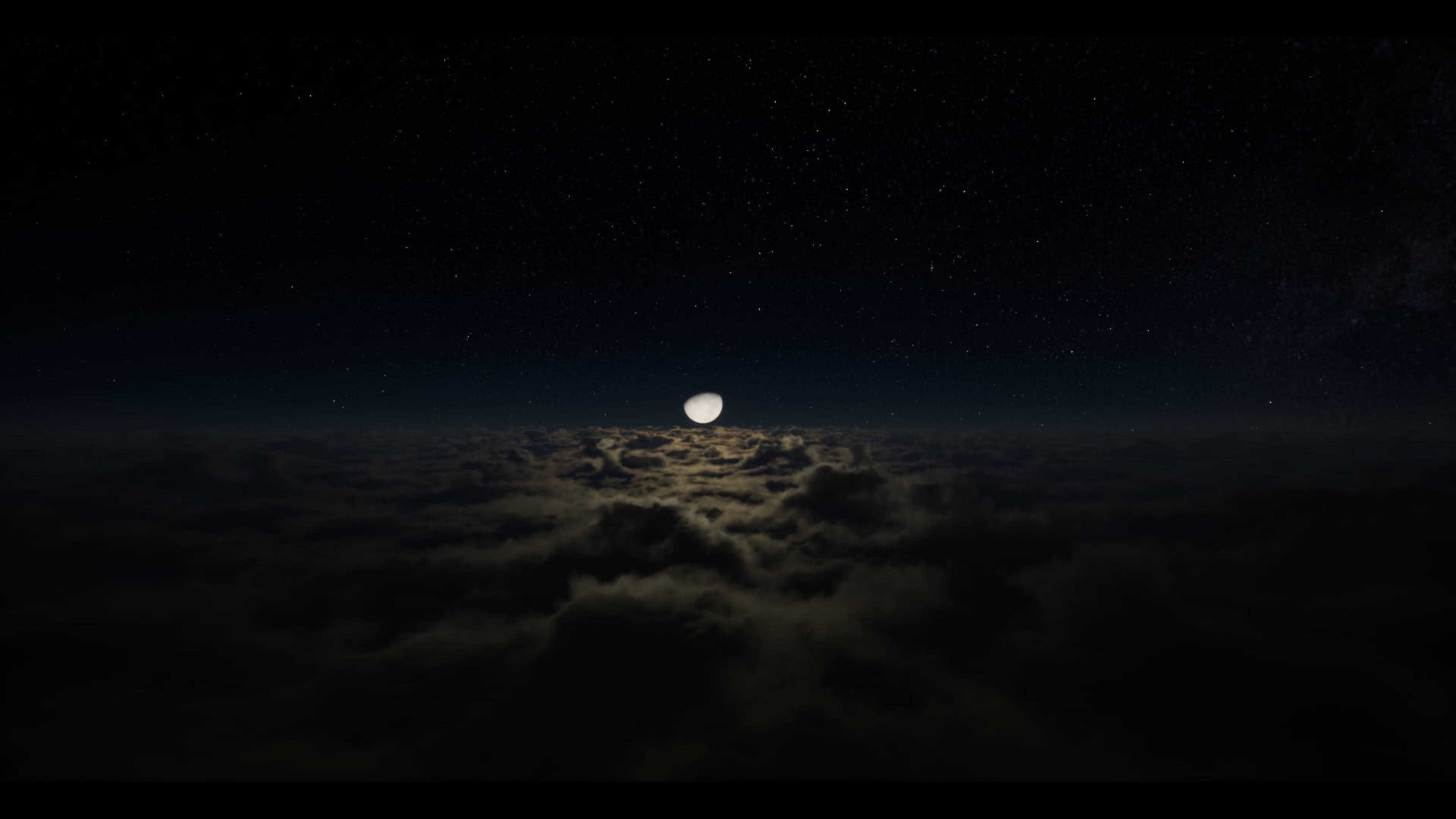 4K Laptop Moon Above Clouds — 3840x2160 wallpaper