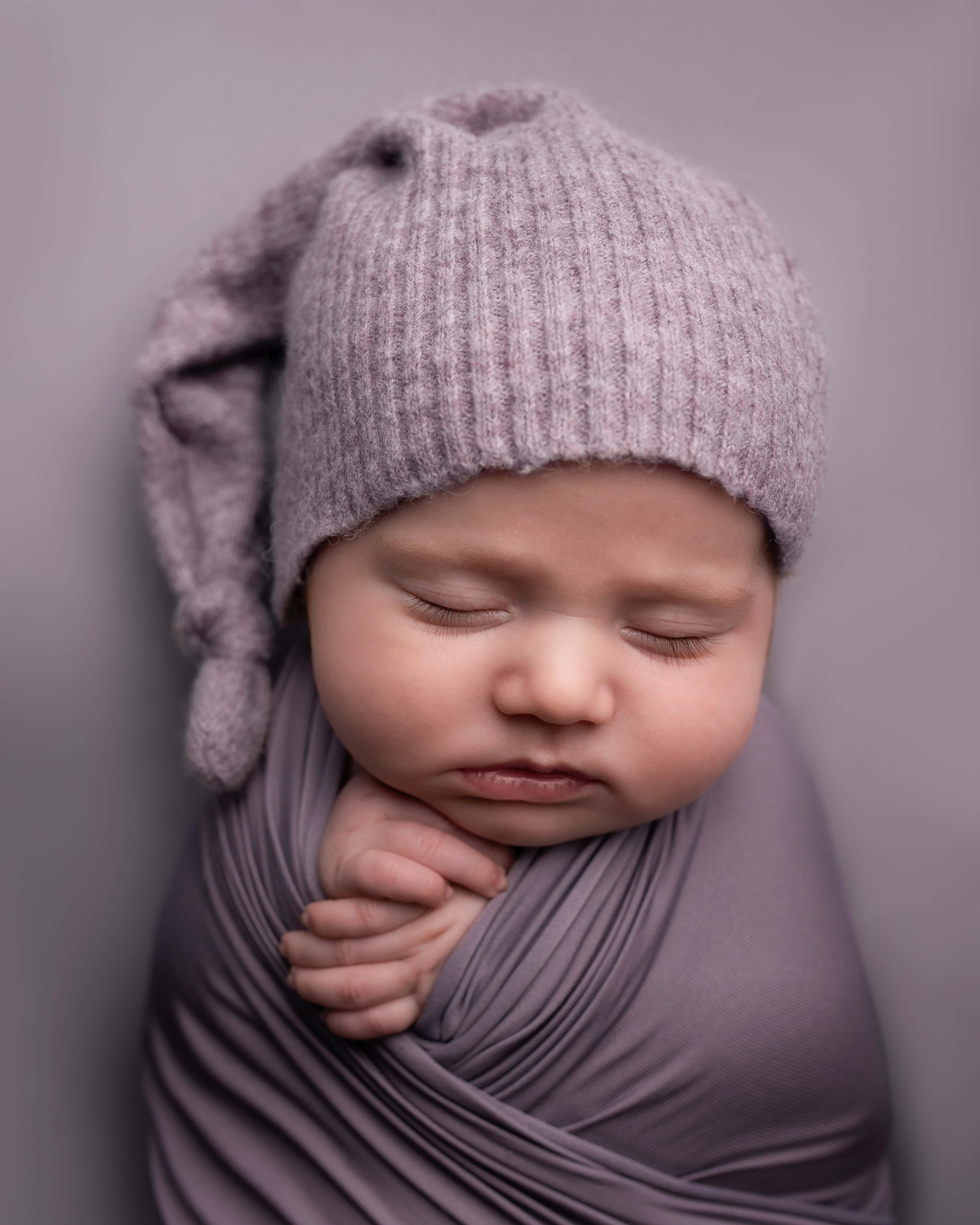 A baby boy in his mother’s arms enjoying the tender moment. — 3910x4888 wallpaper