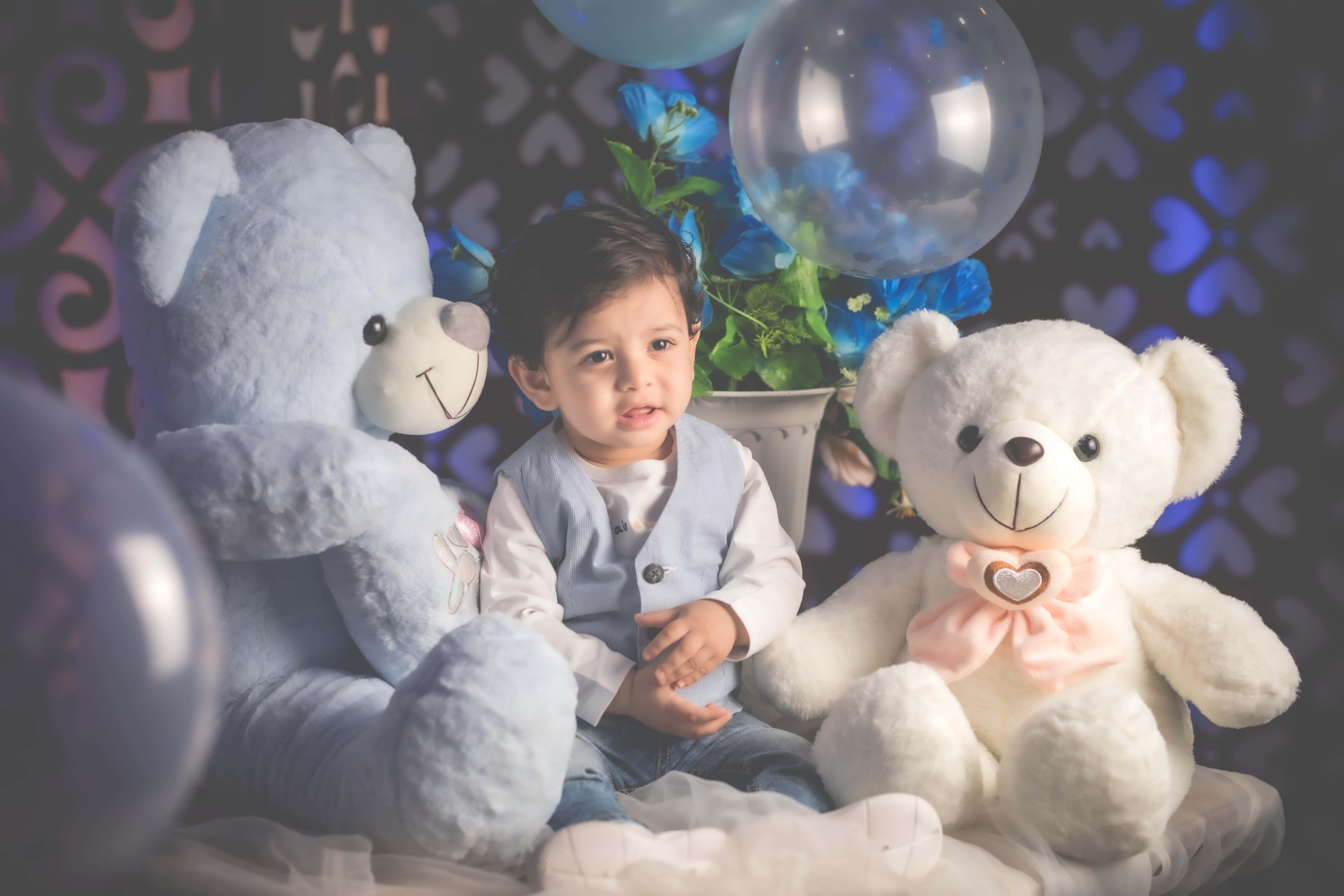 A baby boy lying in bed, ready to start the day — 6720x4480 wallpaper