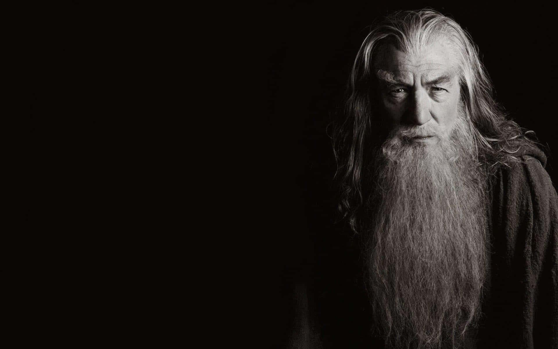 a black and white photo of a man with long hair — 1920x1200 wallpaper