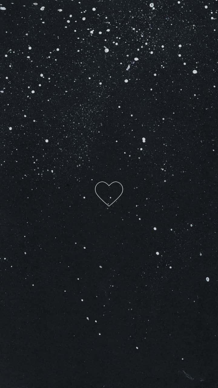 a black background with a heart in the sky — 720x1280 wallpaper