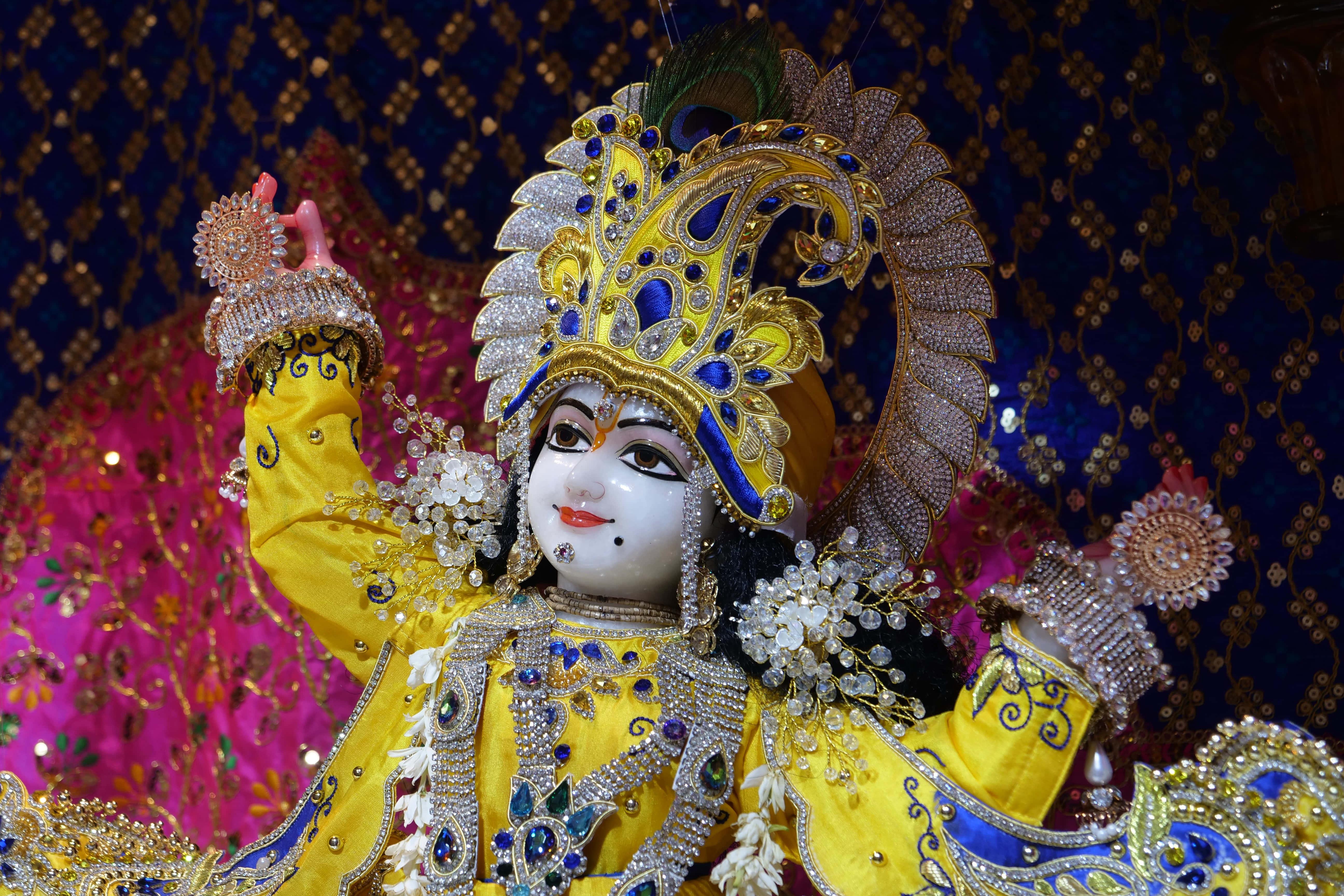 A Calm Lord Krishna Silhouetted Against a Lush Mountain