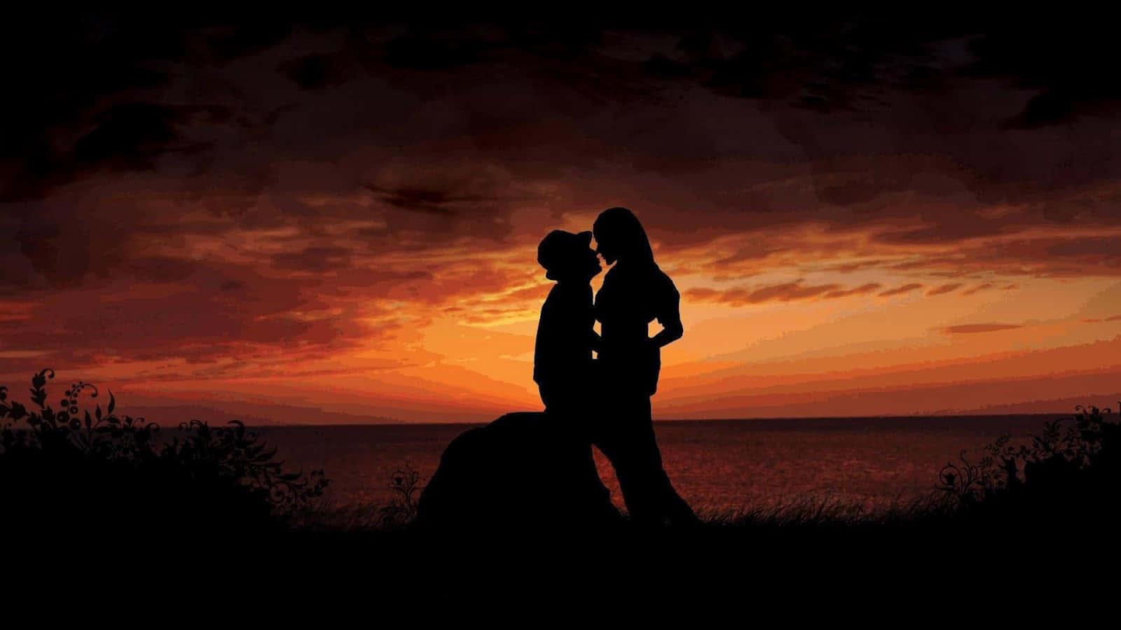 a couple is silhouetted against the sunset — 1600x900 wallpaper