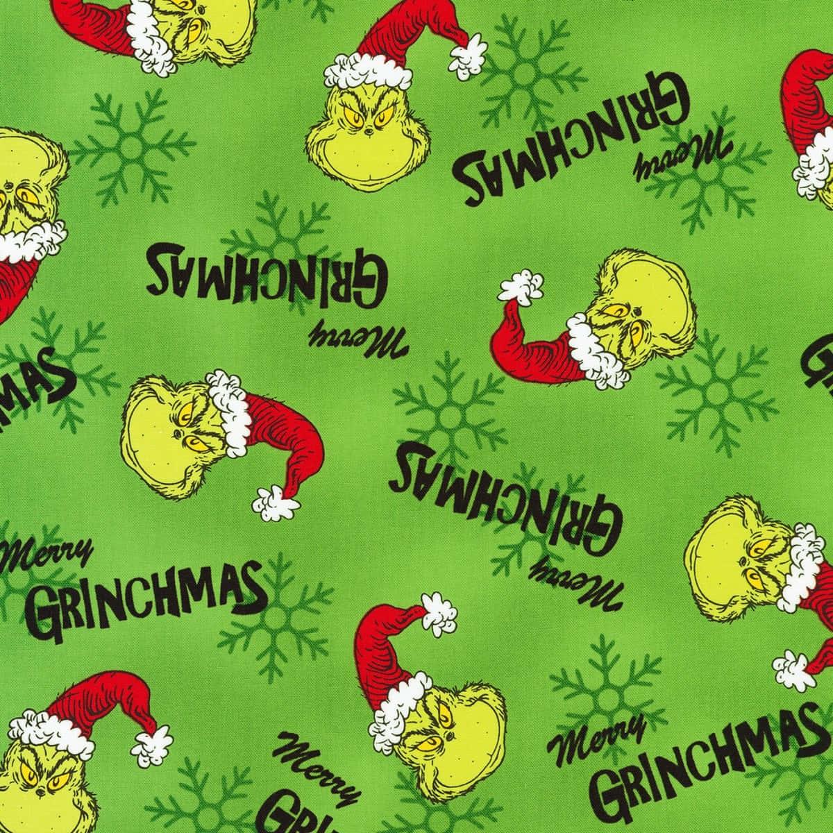 a green fabric with a grinch hat and a christmas tree — 1200x1200 wallpaper