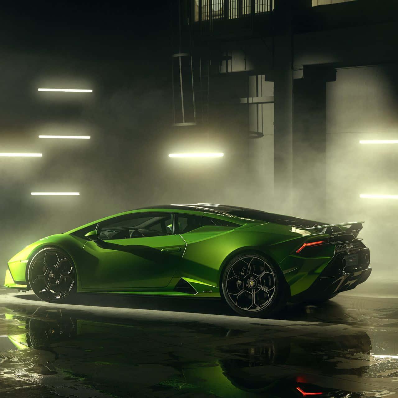 a green lamborghini huracan is parked in a dark garage — 1280x1280 wallpaper