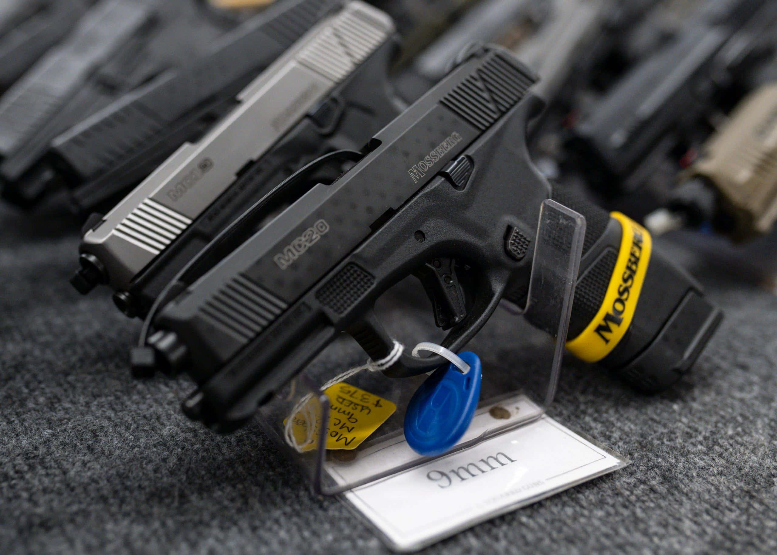 a gun is on display — 2560x1828 wallpaper