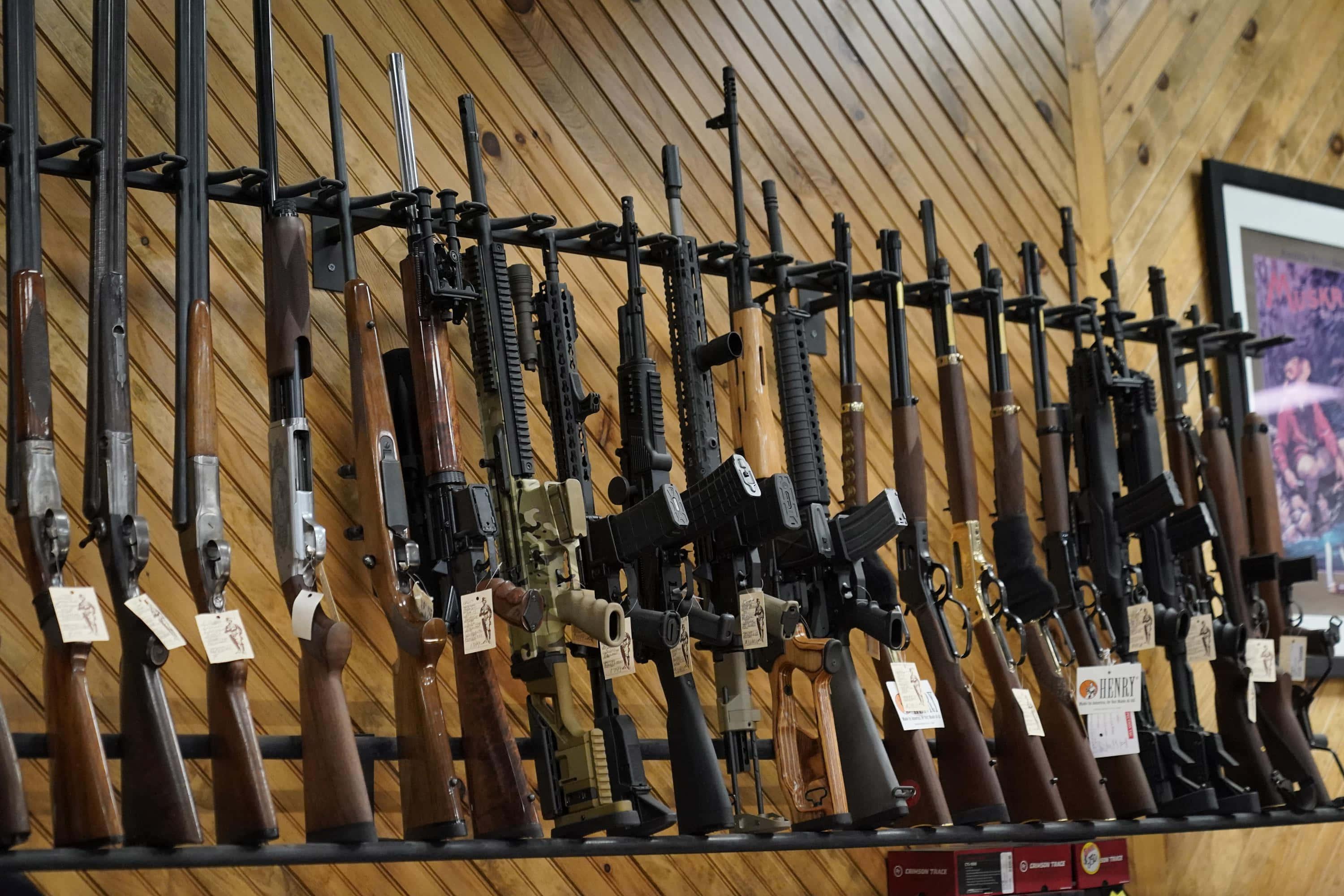 a gun store with many guns on display — 3000x2000 wallpaper