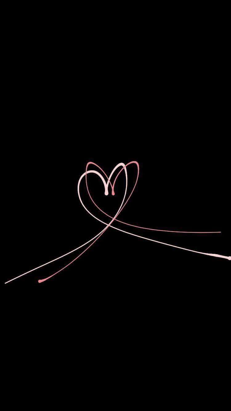 a heart drawn on a black background — 750x1334 wallpaper