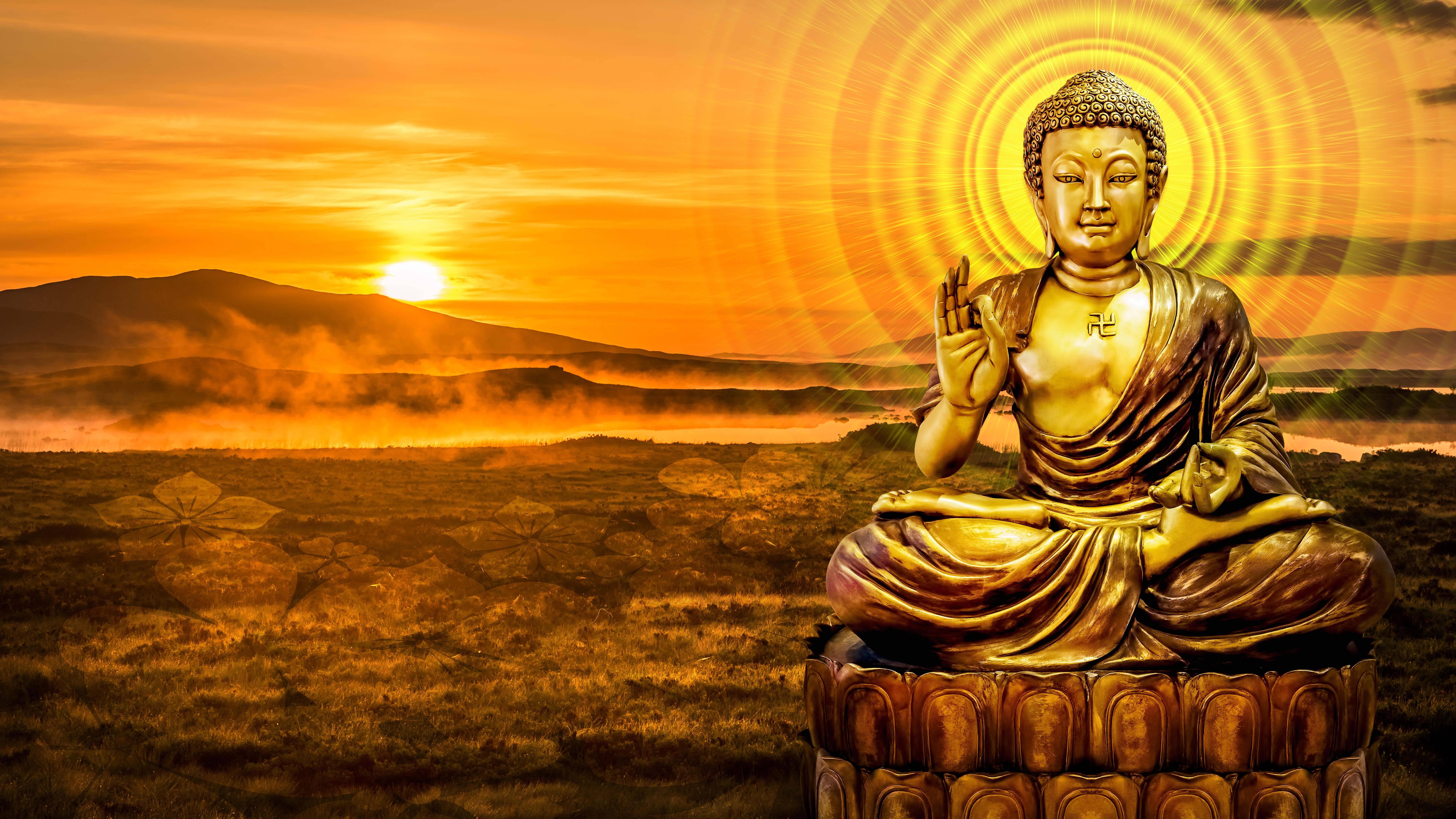 A majestic gold buddha statue glistens in the evening sun — 7680x4320 wallpaper