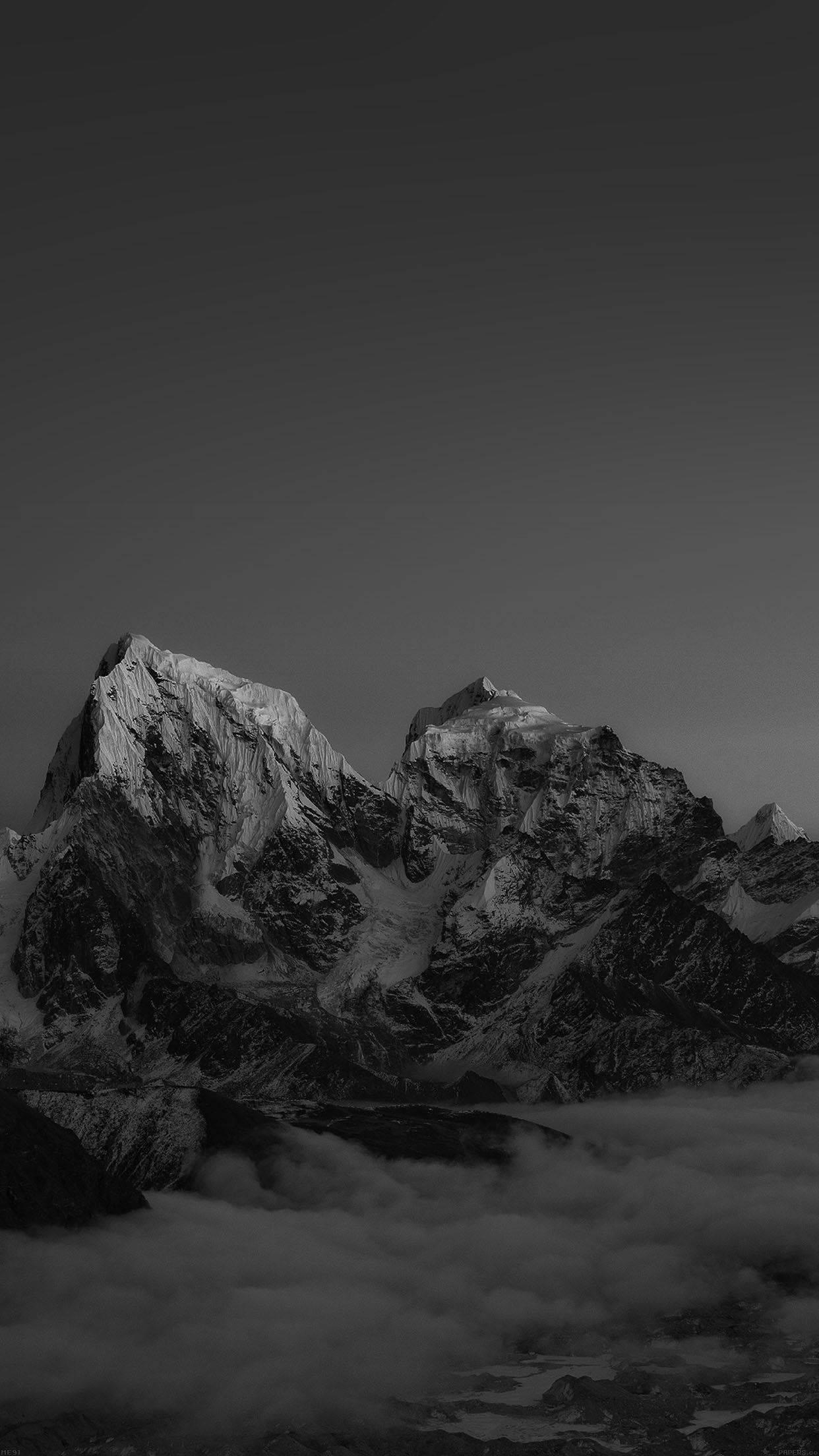 A majestic mountain peak in monochrome.