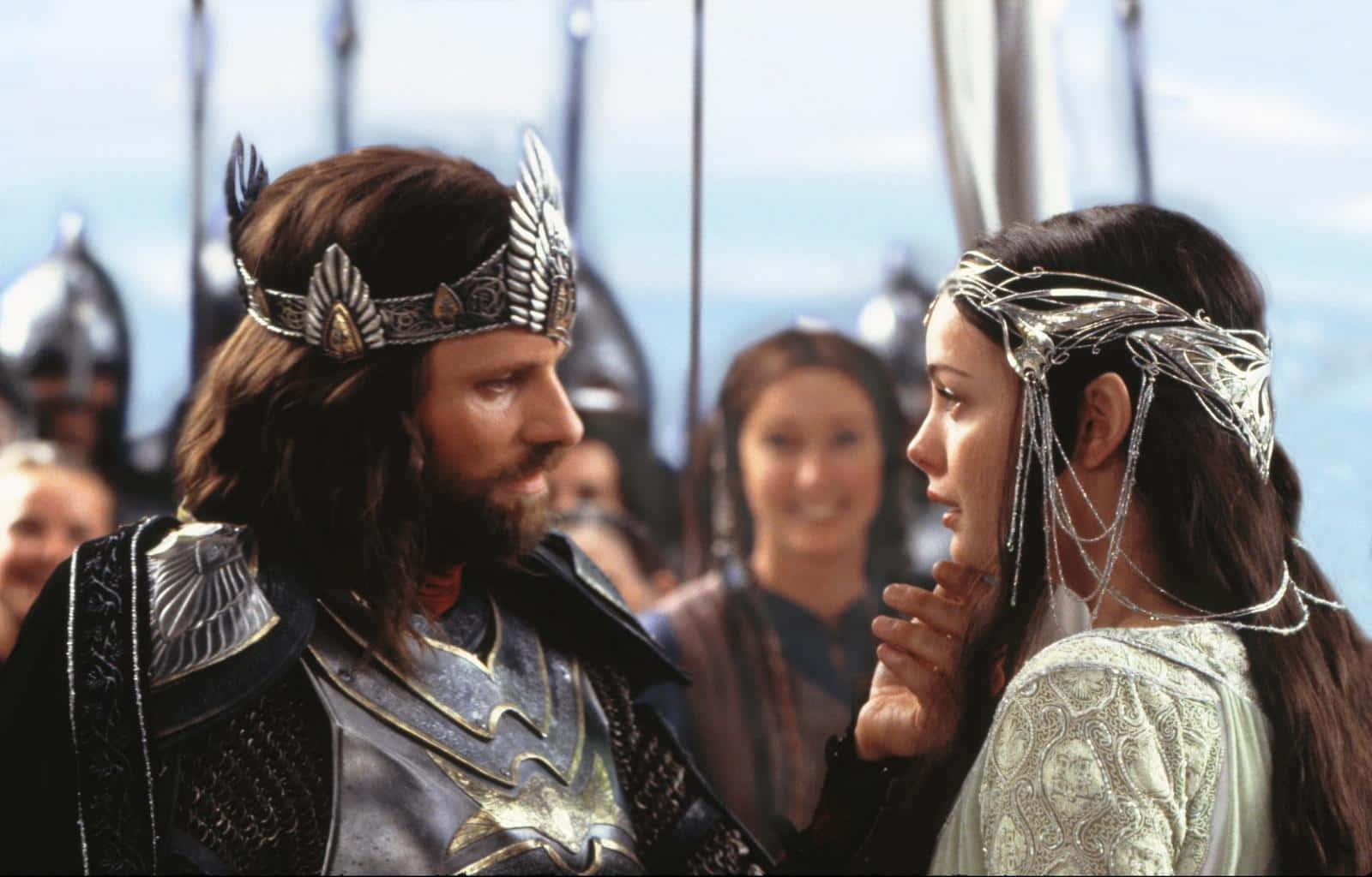 a man and woman in medieval costumes are standing next to each other — 1600x1024 wallpaper