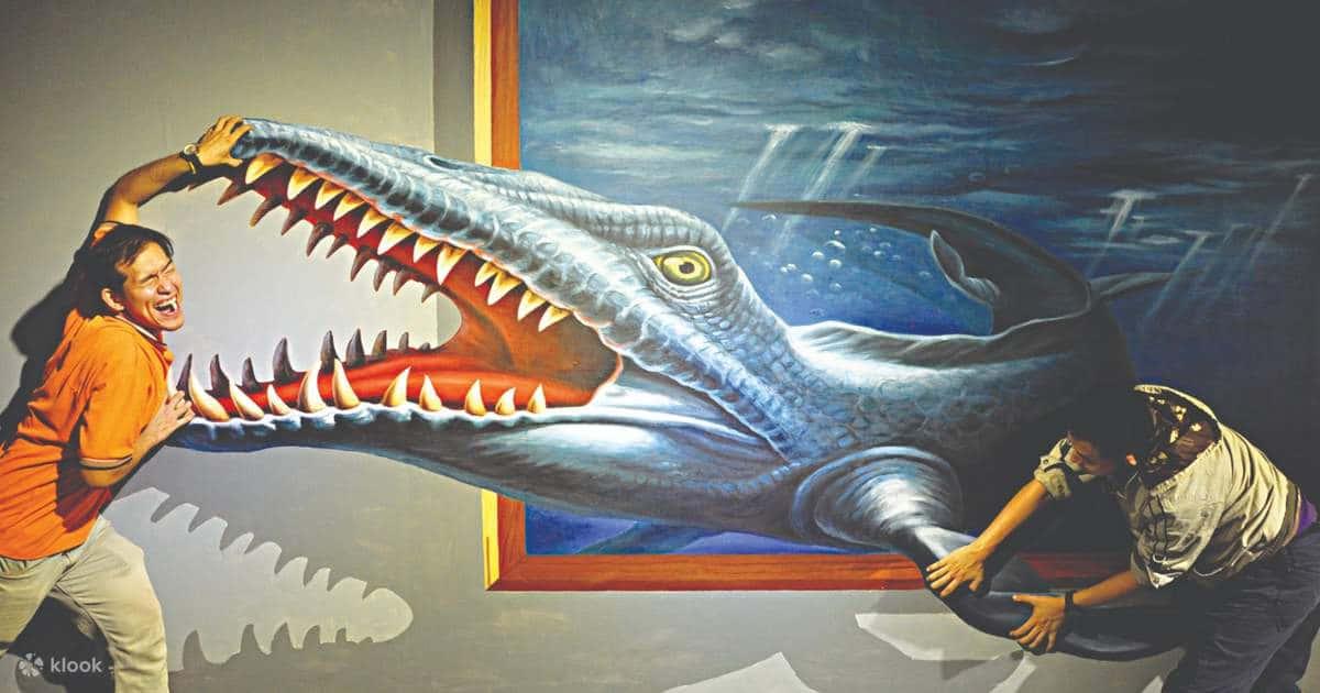 a man and woman standing next to a painting of a shark — 1200x630 wallpaper
