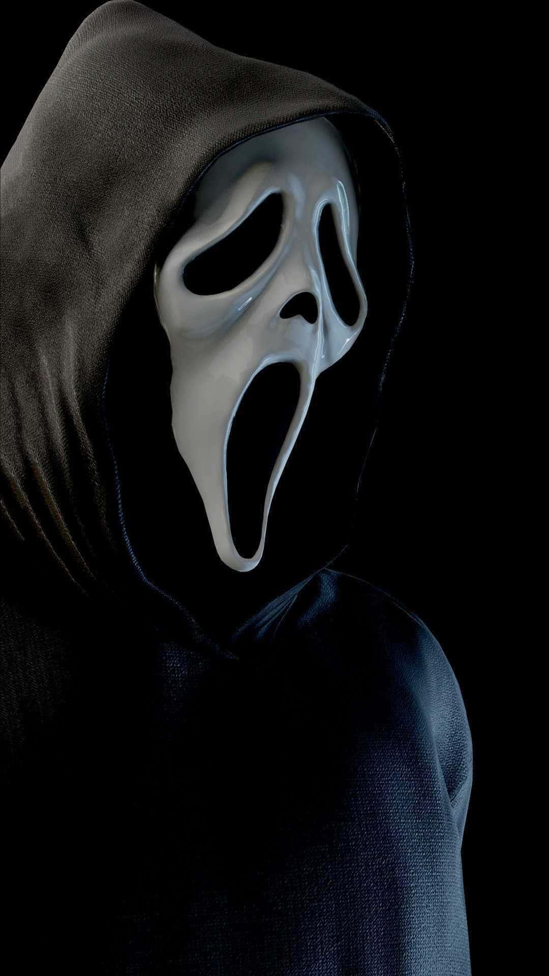 a man in a black hoodie with a white mask — 1080x1920 wallpaper