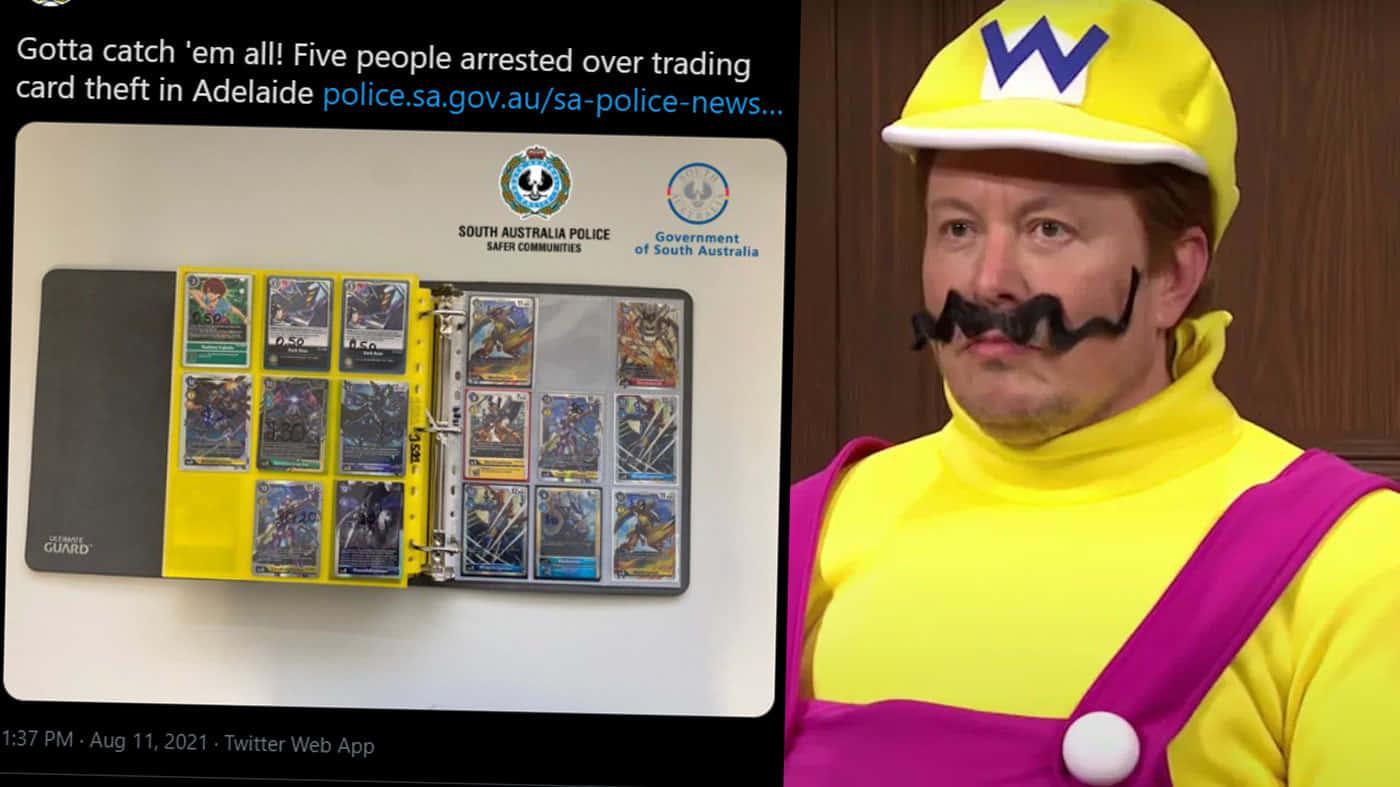a man in a mario costume is holding a card — 1400x787 wallpaper