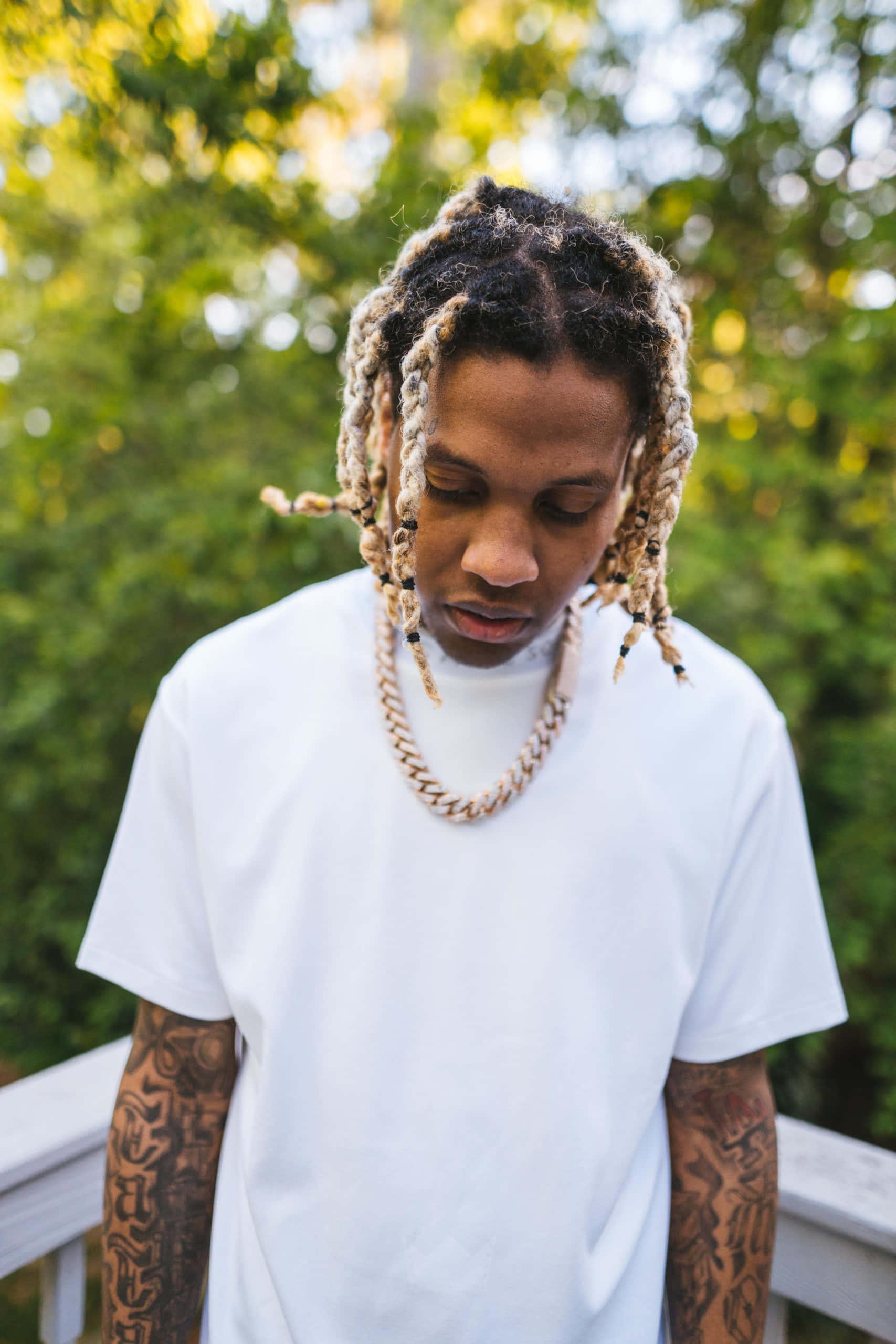 a man with dreadlocks standing on a wooden deck — 1707x2560 wallpaper