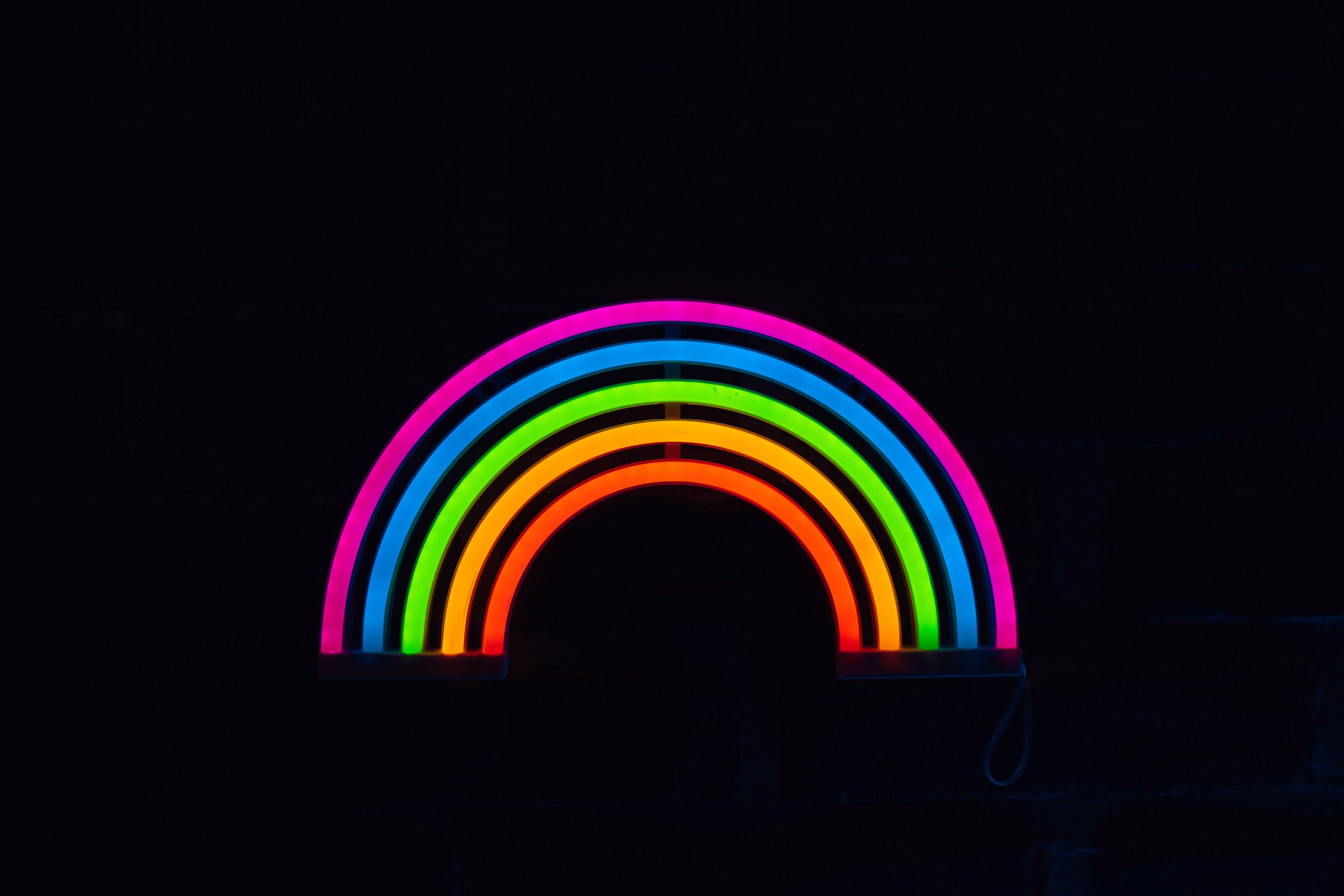 A mesmerising display of neon hues in darkness — 6435x4290 wallpaper