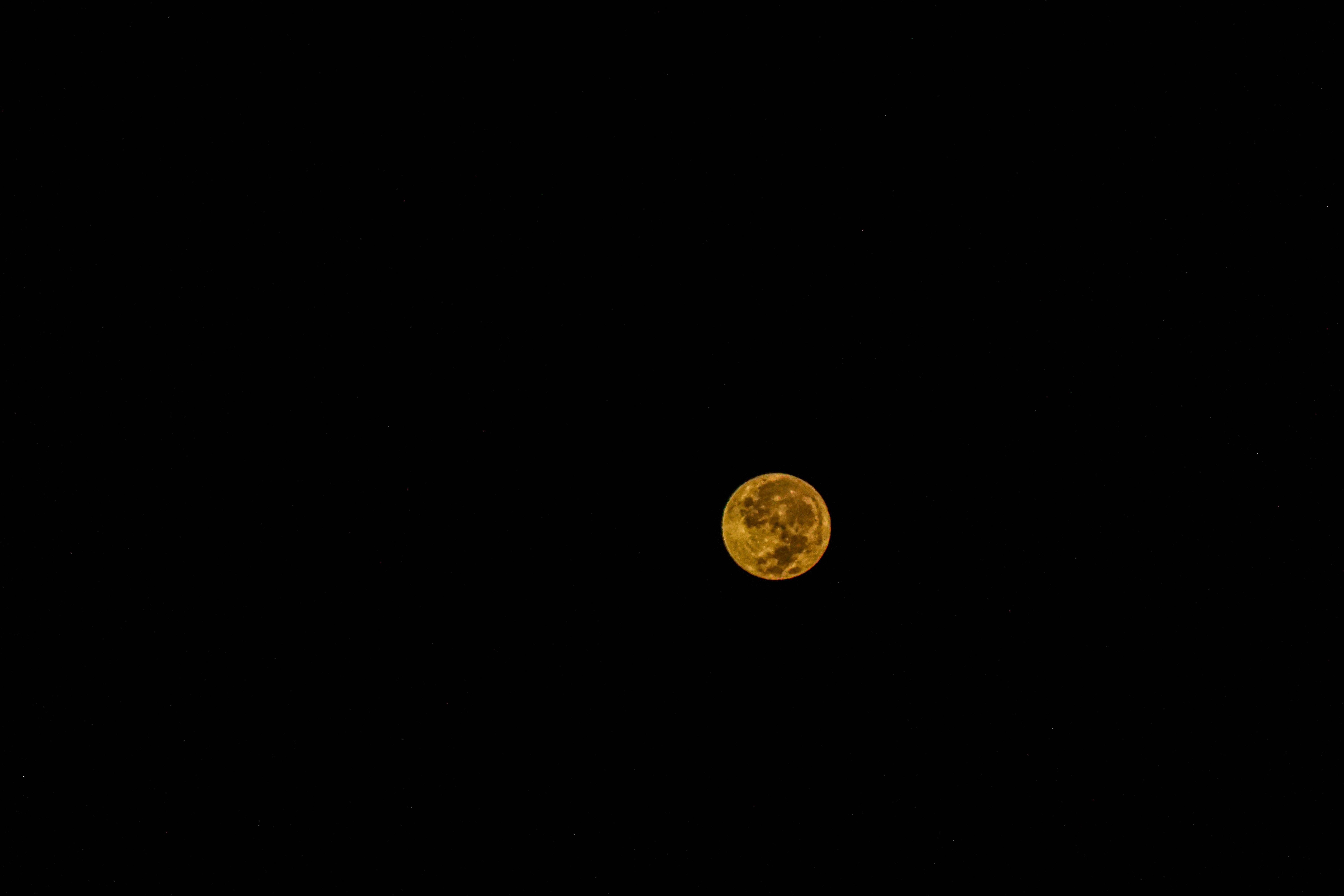 A monochromatic night sky filled with a bright yellow moon — 6000x4000 wallpaper
