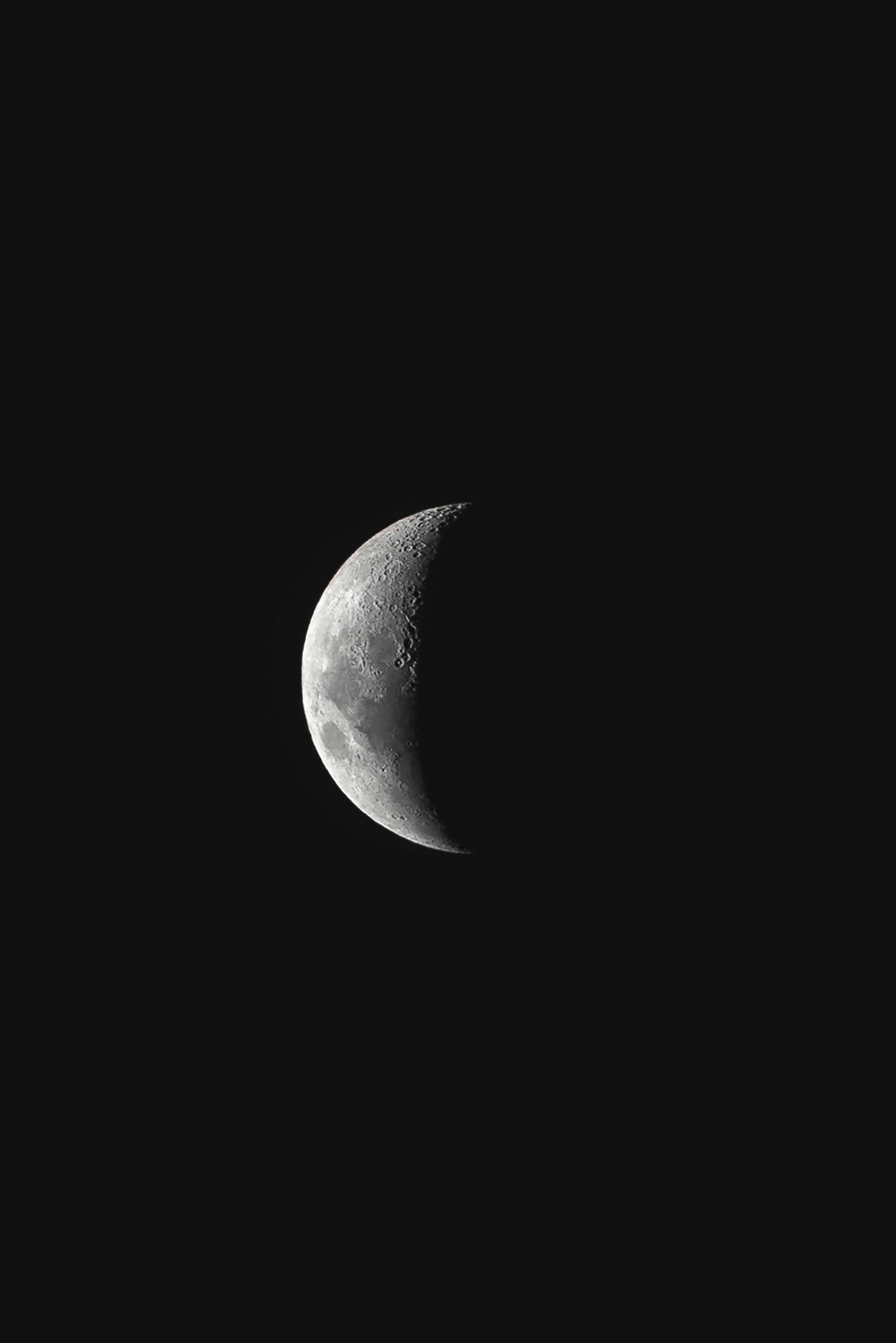 A moonlit night sky in the dark — 4005x6000 wallpaper