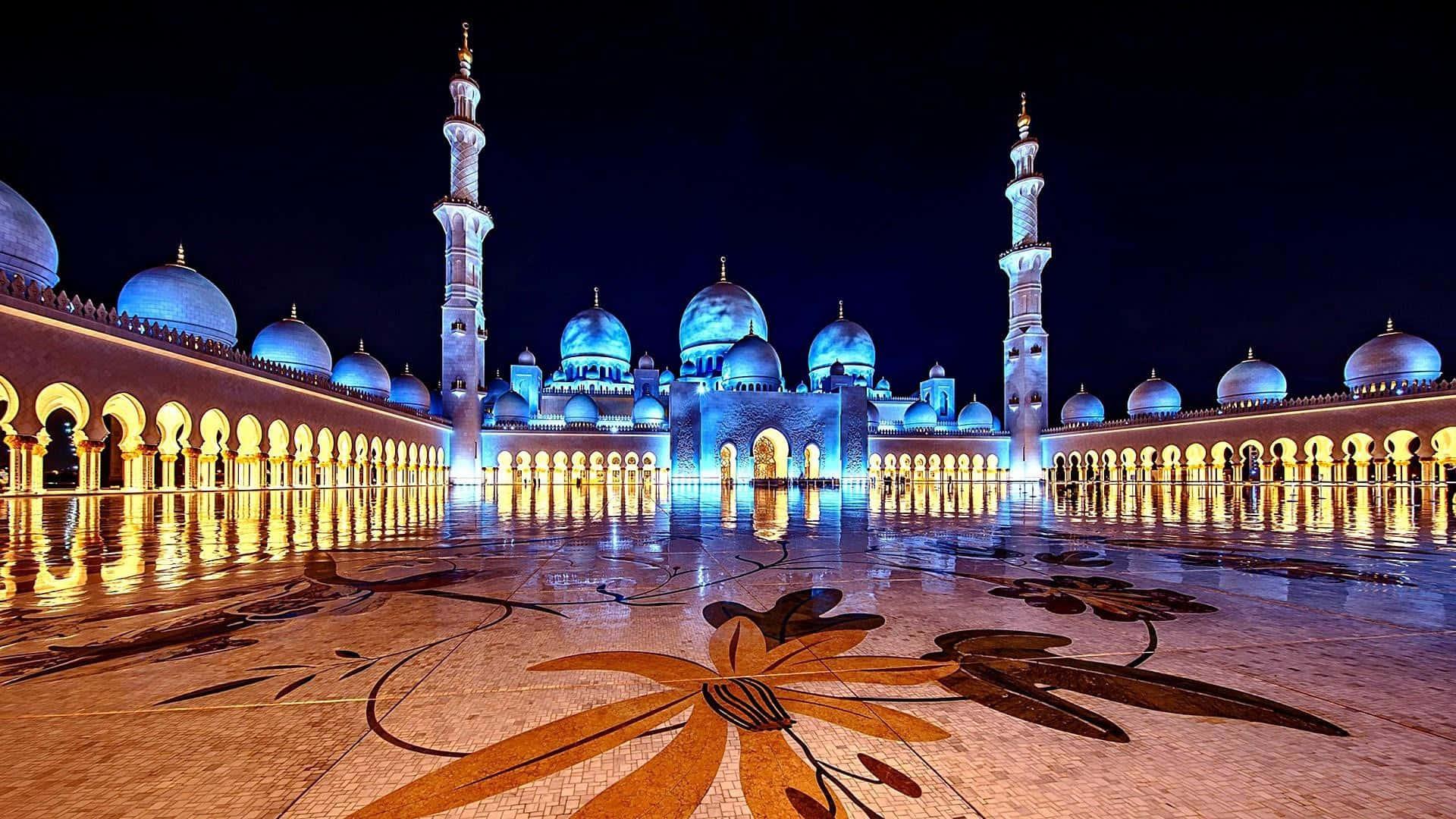 a mosque lit up at night — 1920x1080 wallpaper