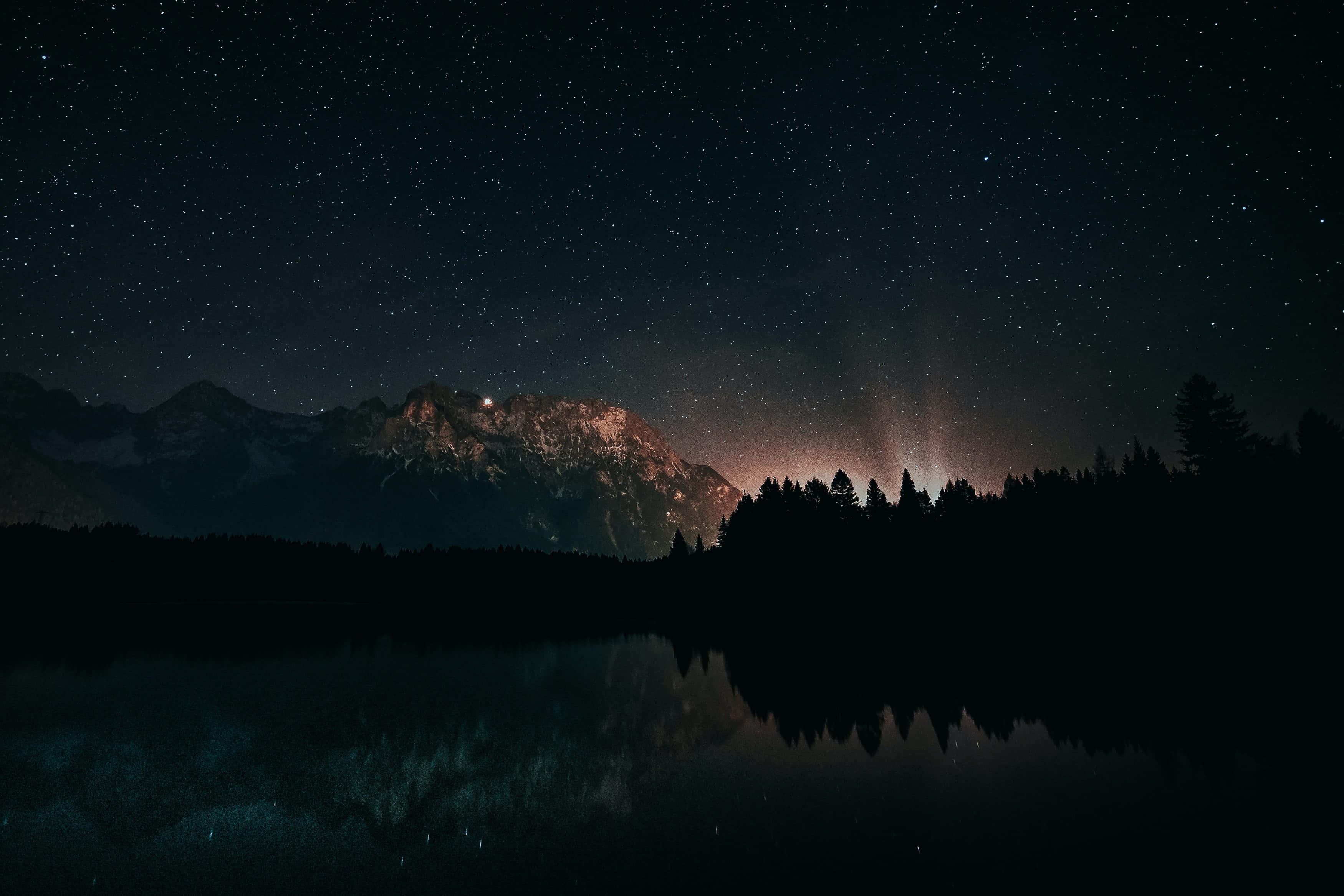 a mountain range with stars and trees in the night — 3500x2333 wallpaper