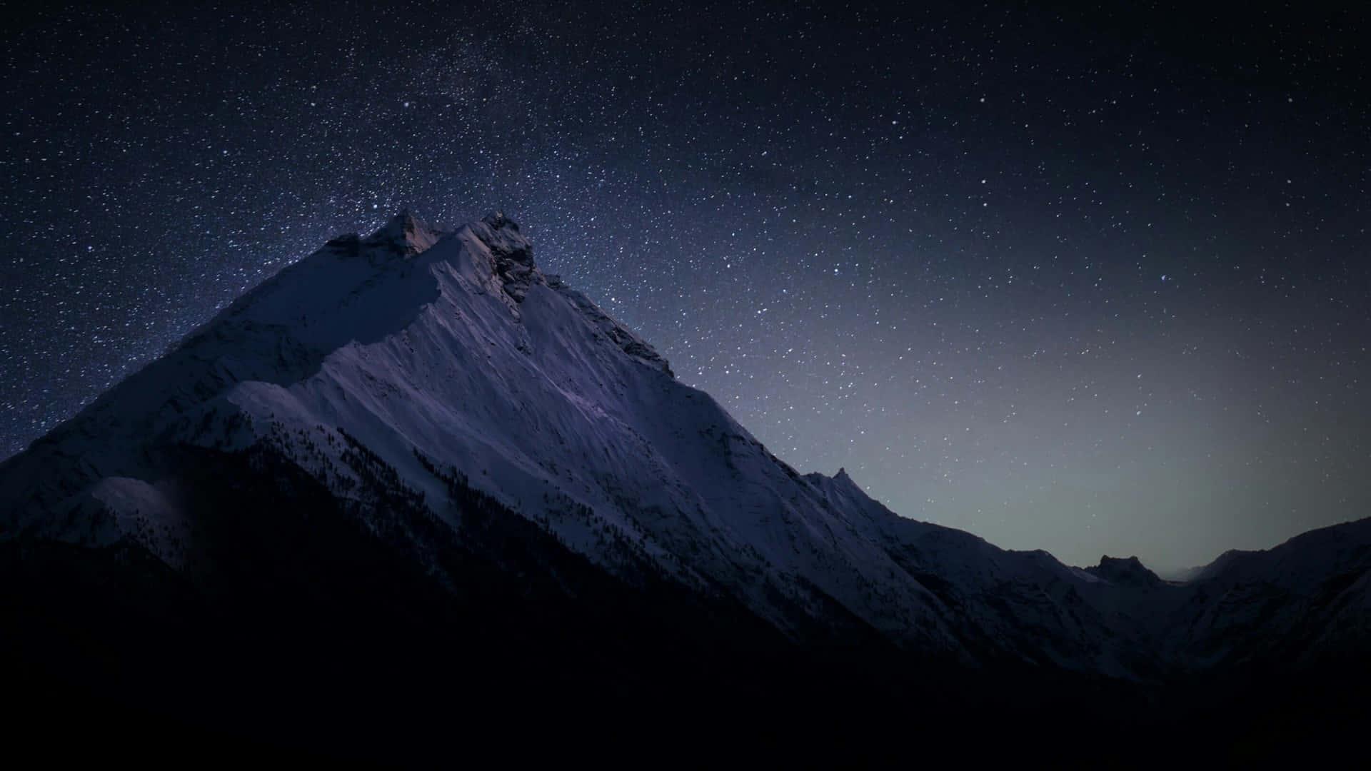 a mountain with stars above it at night — 1920x1080 wallpaper