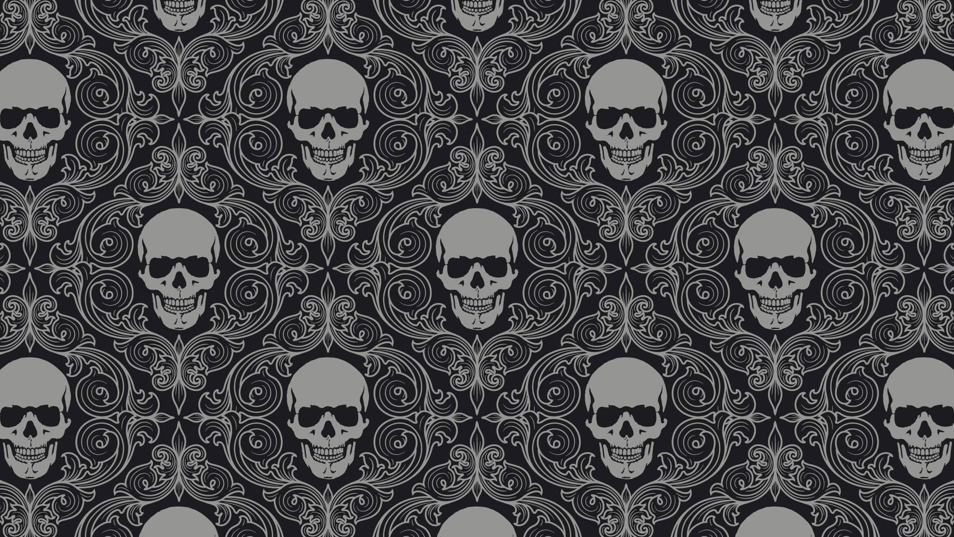 A mysterious skull pattern set against a deep blue background. — 3840x2160 wallpaper