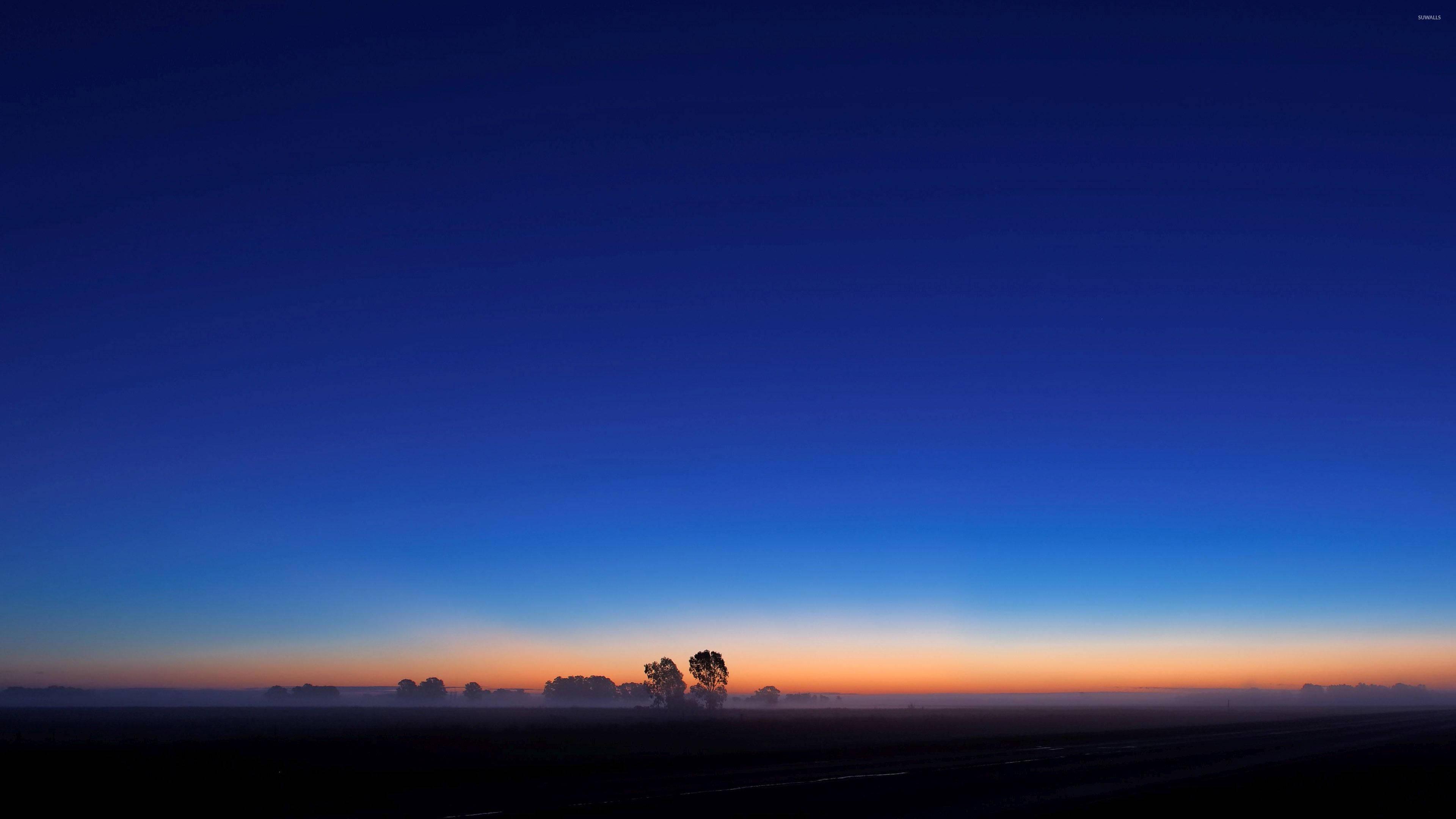 A peaceful Blue Sunrise paints the Sky — 3840x2160 wallpaper