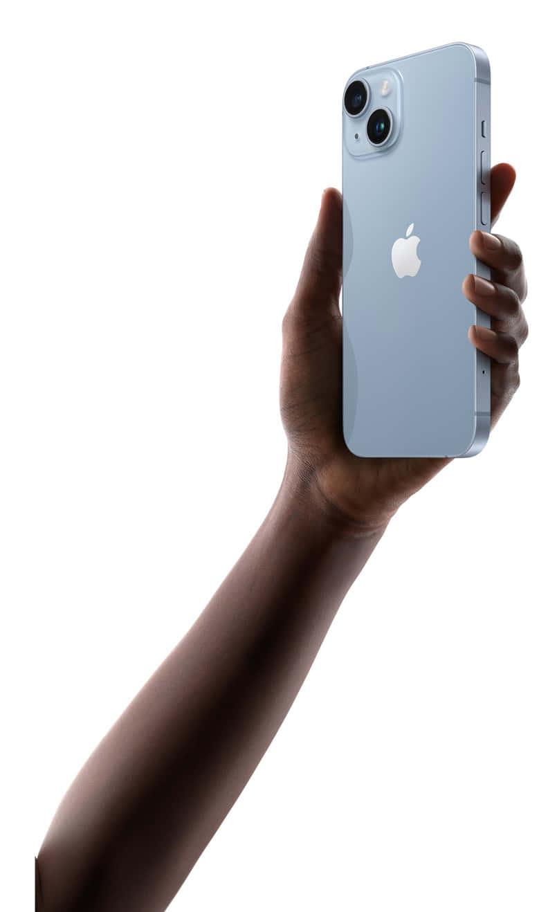 a person holding an iphone 11 in their hand