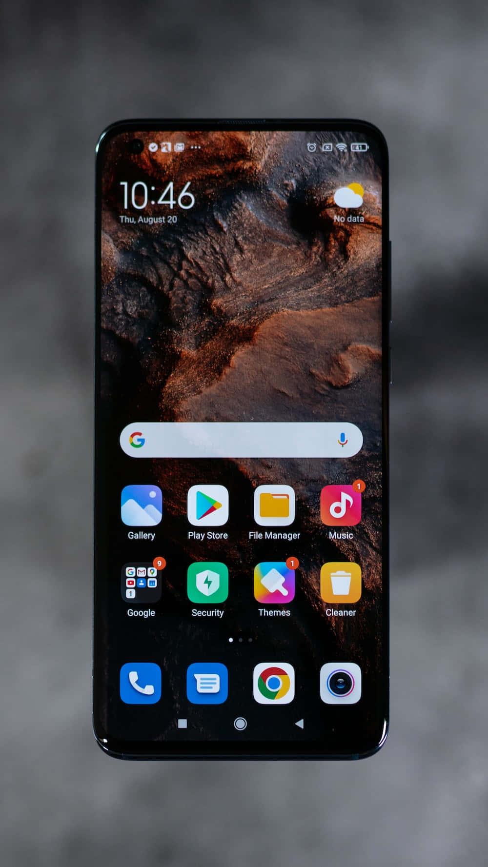 A person using a modern phone with a sleek design