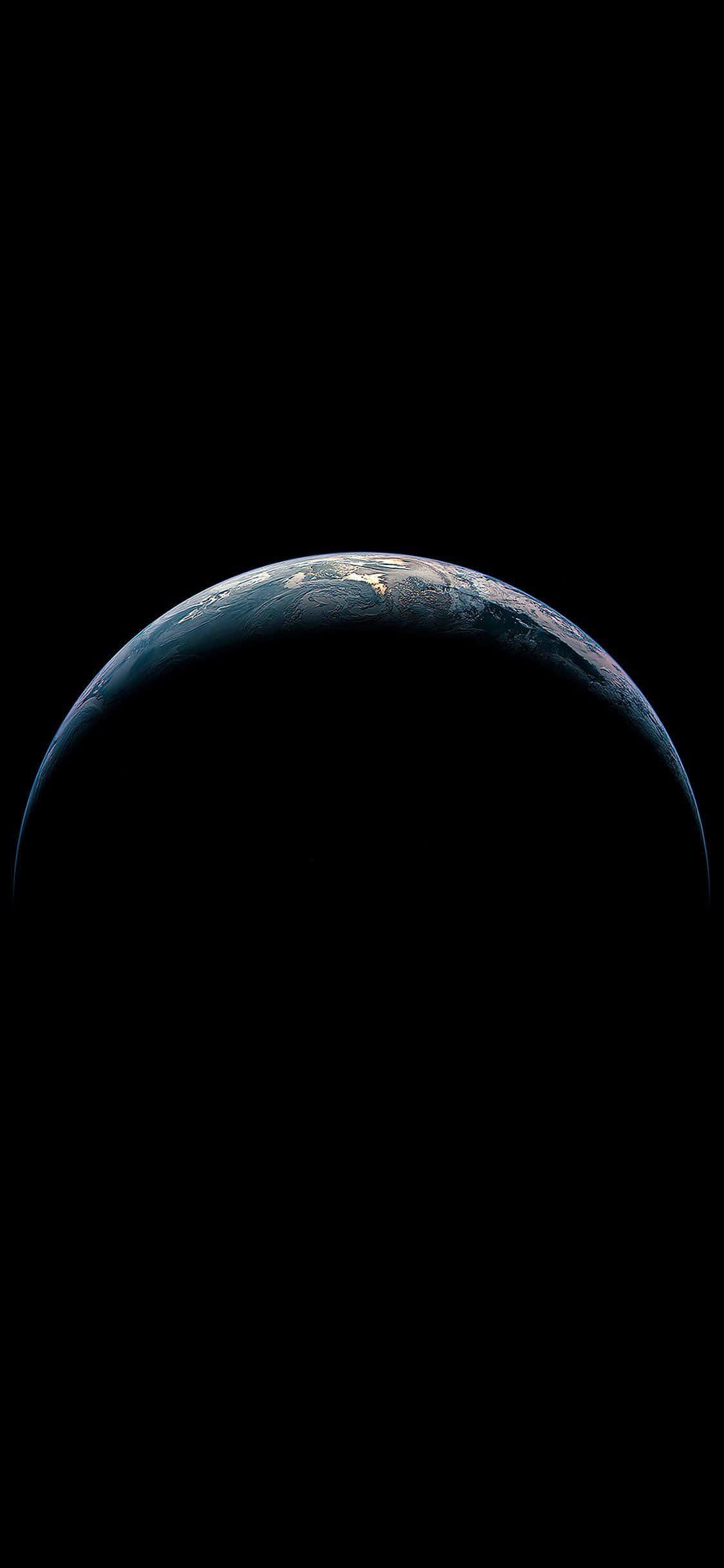 A Picture Perfect View of Earth from Space — 1125x2436 wallpaper