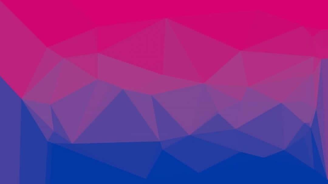 a pink and blue background with triangles — 1080x608 wallpaper