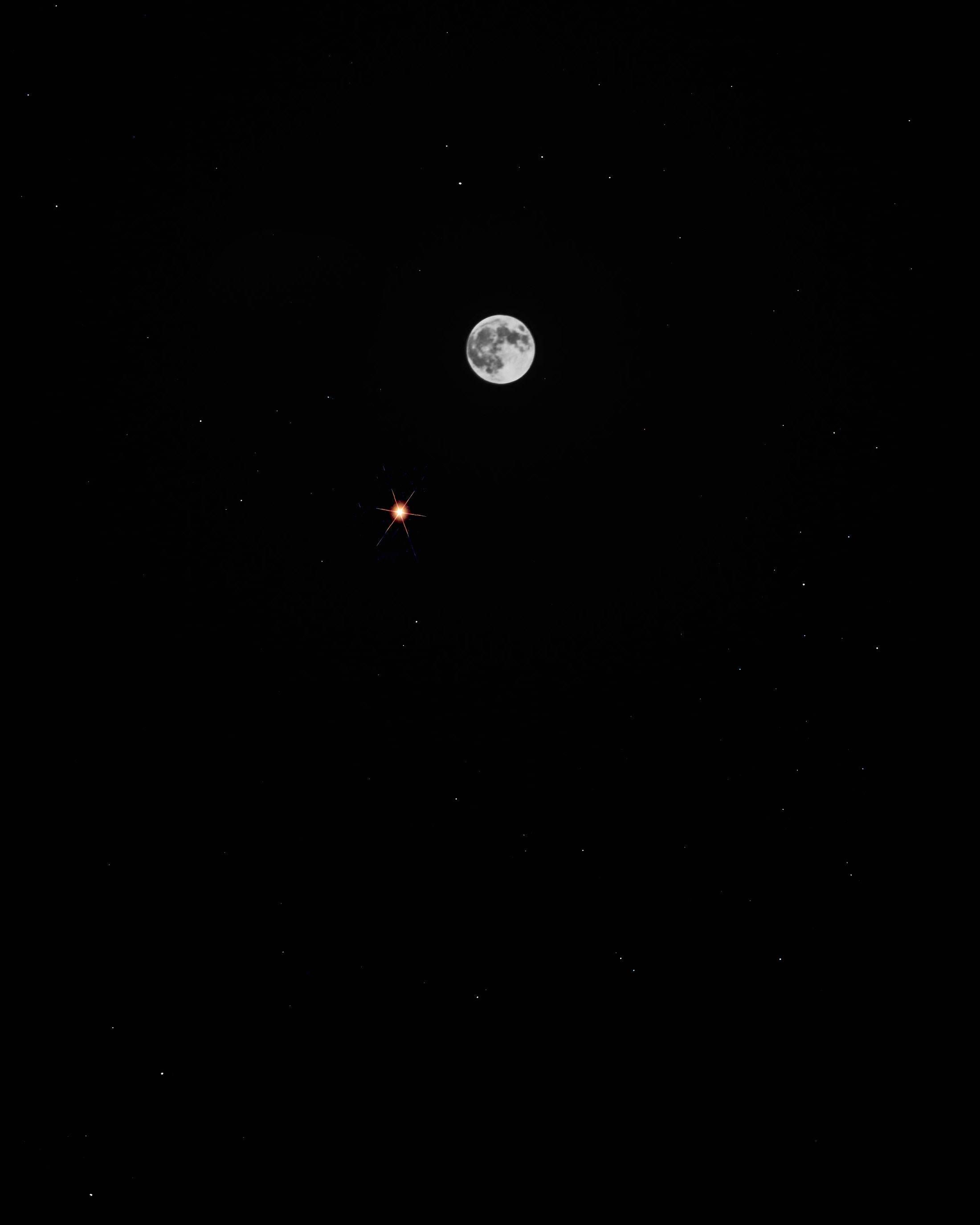 A serene and calming night sky with a crescent moon, twinkling stars and soft clouds — 2200x2750 wallpaper