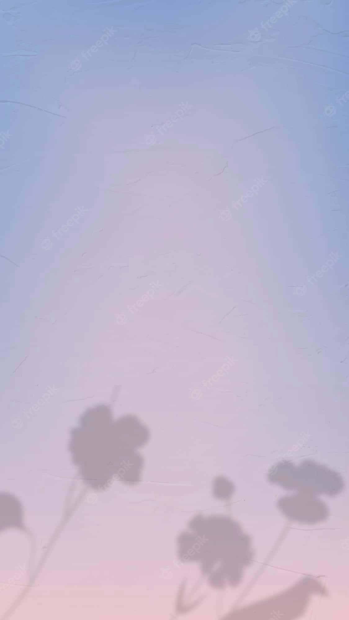 a silhouette of a bird on a blue sky background — 1125x2000 wallpaper