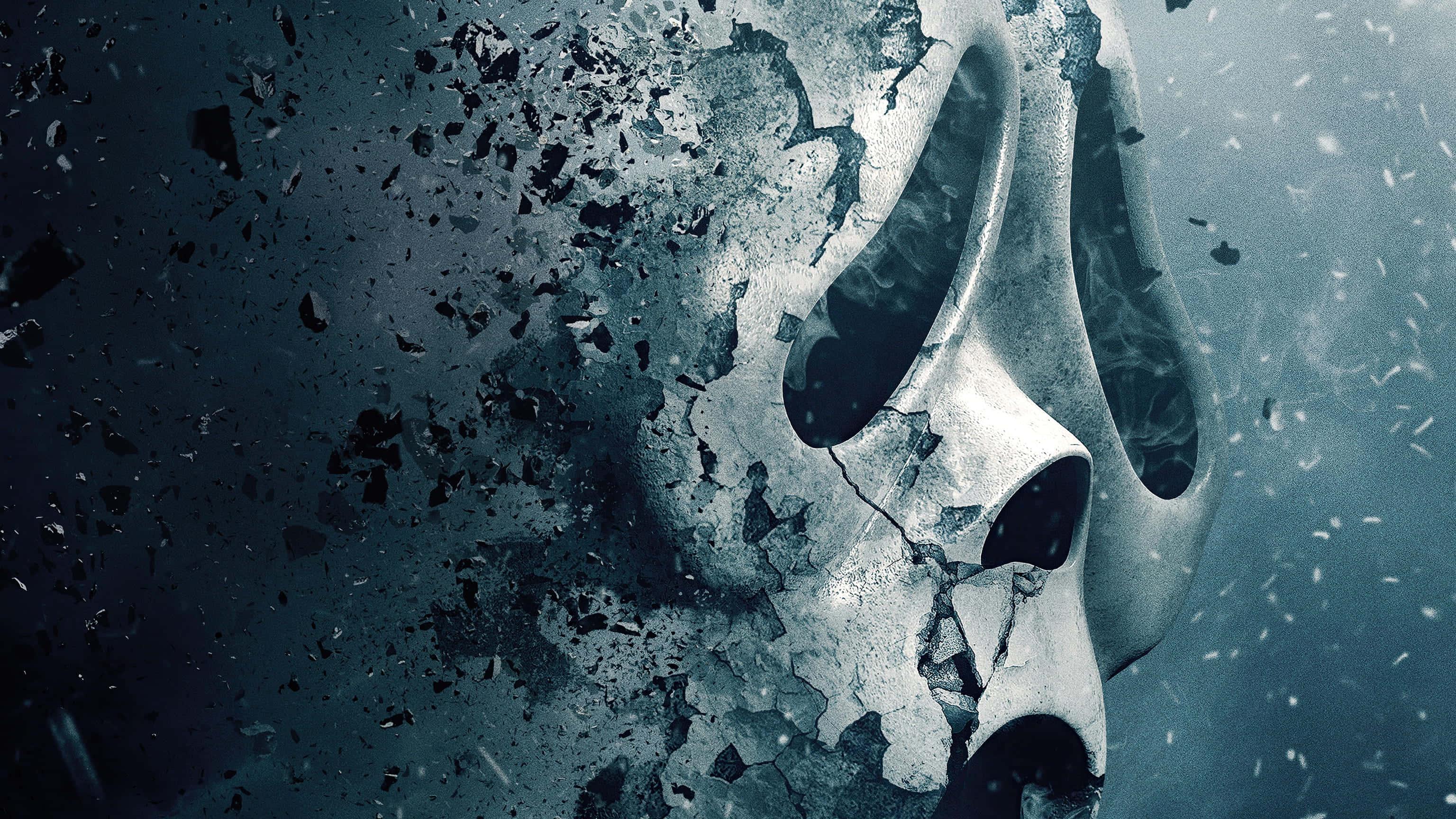 a skull with a broken face is shown in the background — 3072x1728 wallpaper