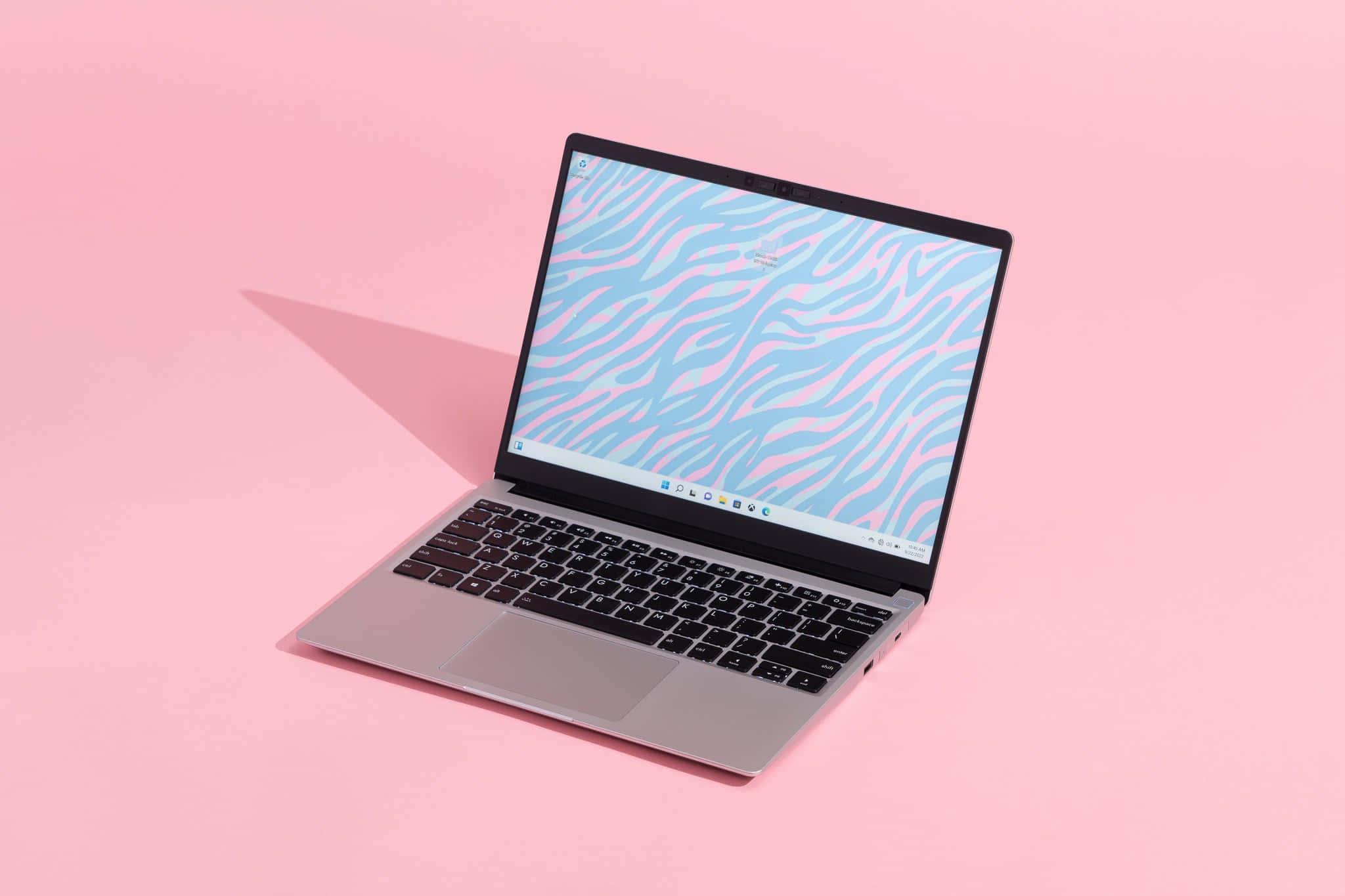 A sleek and modern laptop stands out amongst its surroundings — 2048x1365 wallpaper